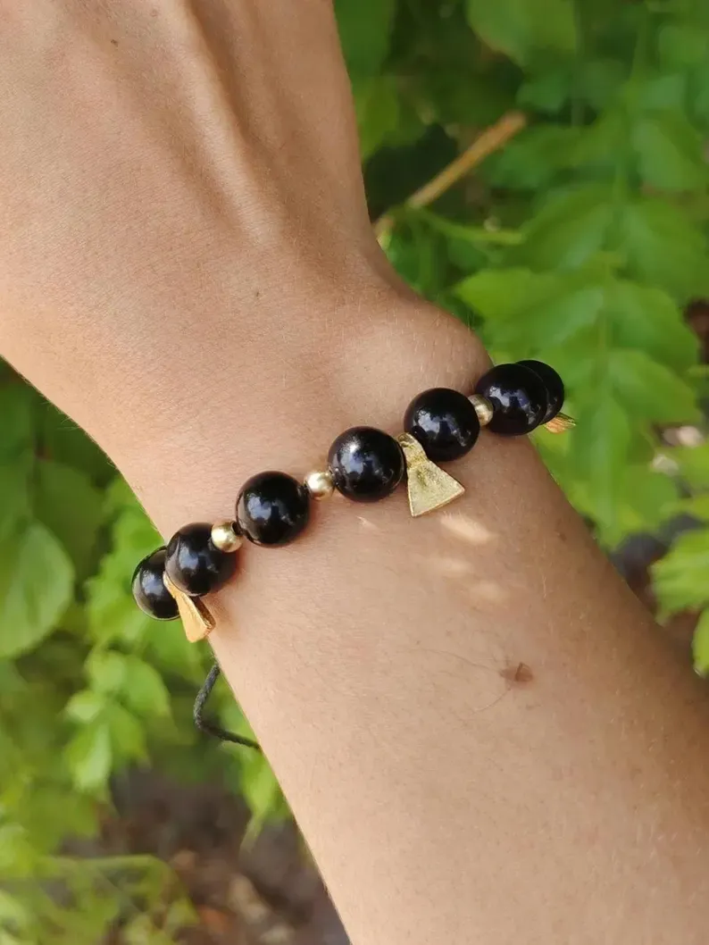Bracelet en obsidienne dorée · Bracelet tribal noir et doré · Laiton doré · Bracelet de perles