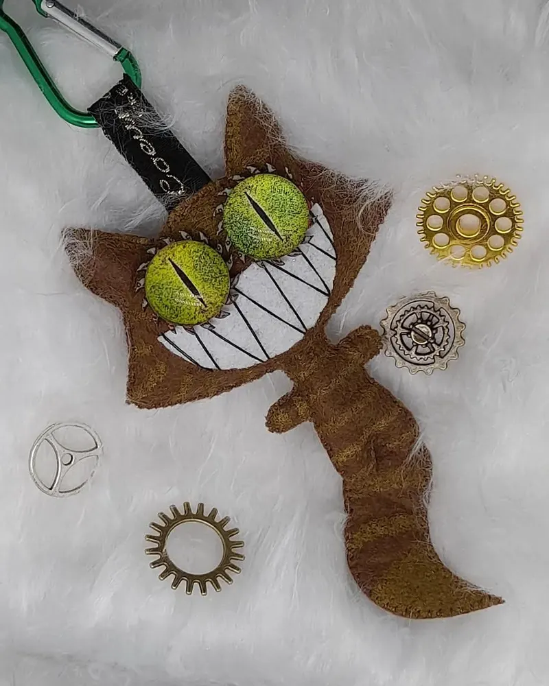 Chat-totem "inspiration cheshire" porte clef