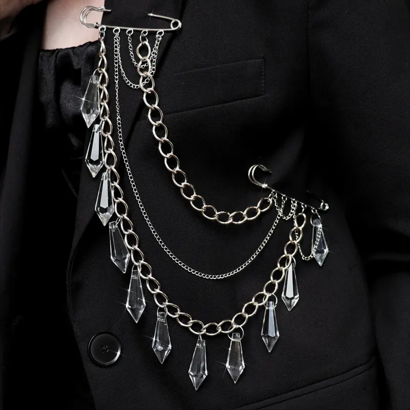 Broche à chaines et pendentifs en verre